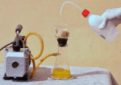 Wash gold water that attached to the filter paper by using a spray bottle. If gold color changes to white, show that out. (Do not fill much water 3 times of gold water)